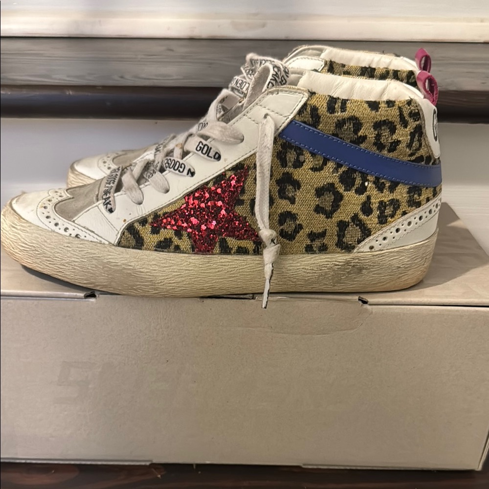 Golden goose women’s sneaker 

Leopard Print High-Top Sneakers with Red Star